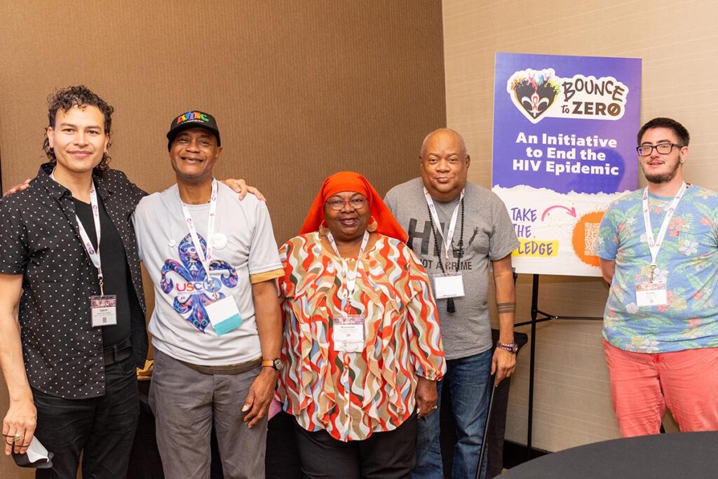 Convention goers pose in a group shot.