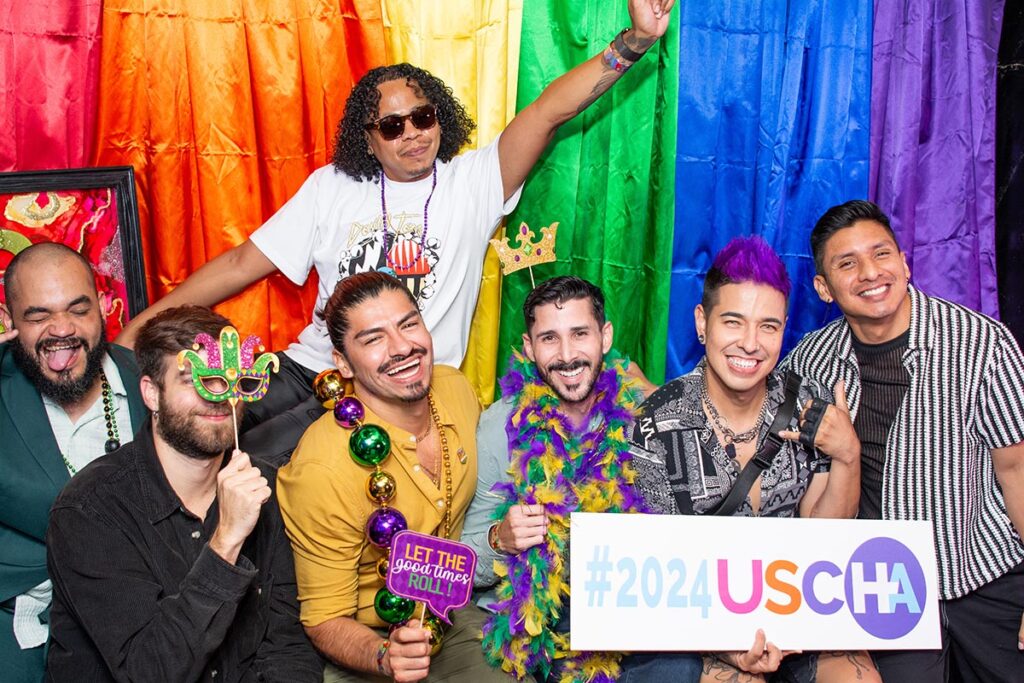 Convention goers pose in a group shot.