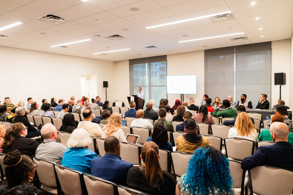 People attending a panel at Biomedical H.I.V. Summit