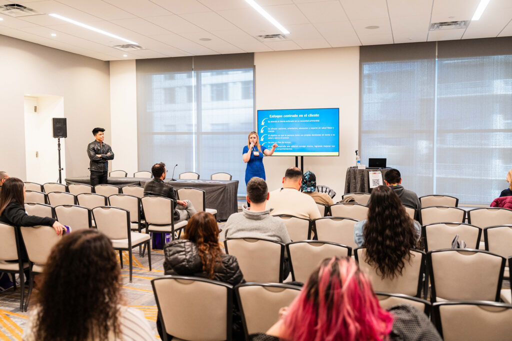 People attending a panel at Biomedical H.I.V. Summit