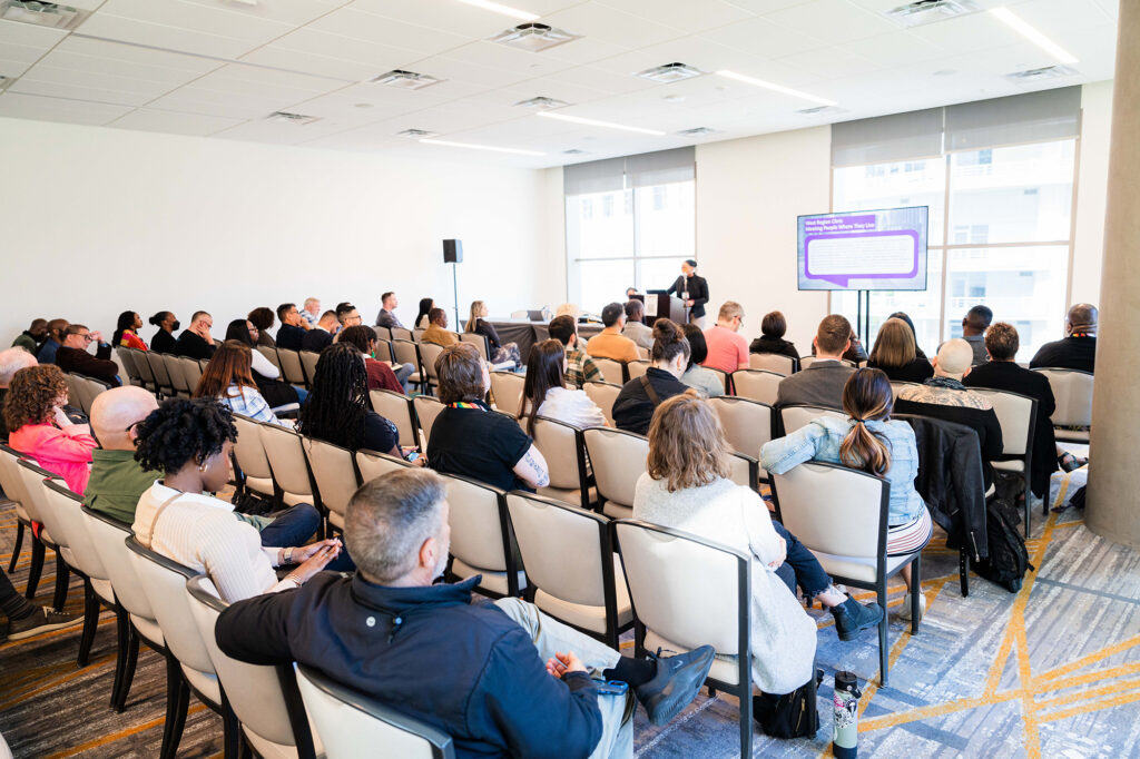 People attending a panel at Biomedical H.I.V. Summit